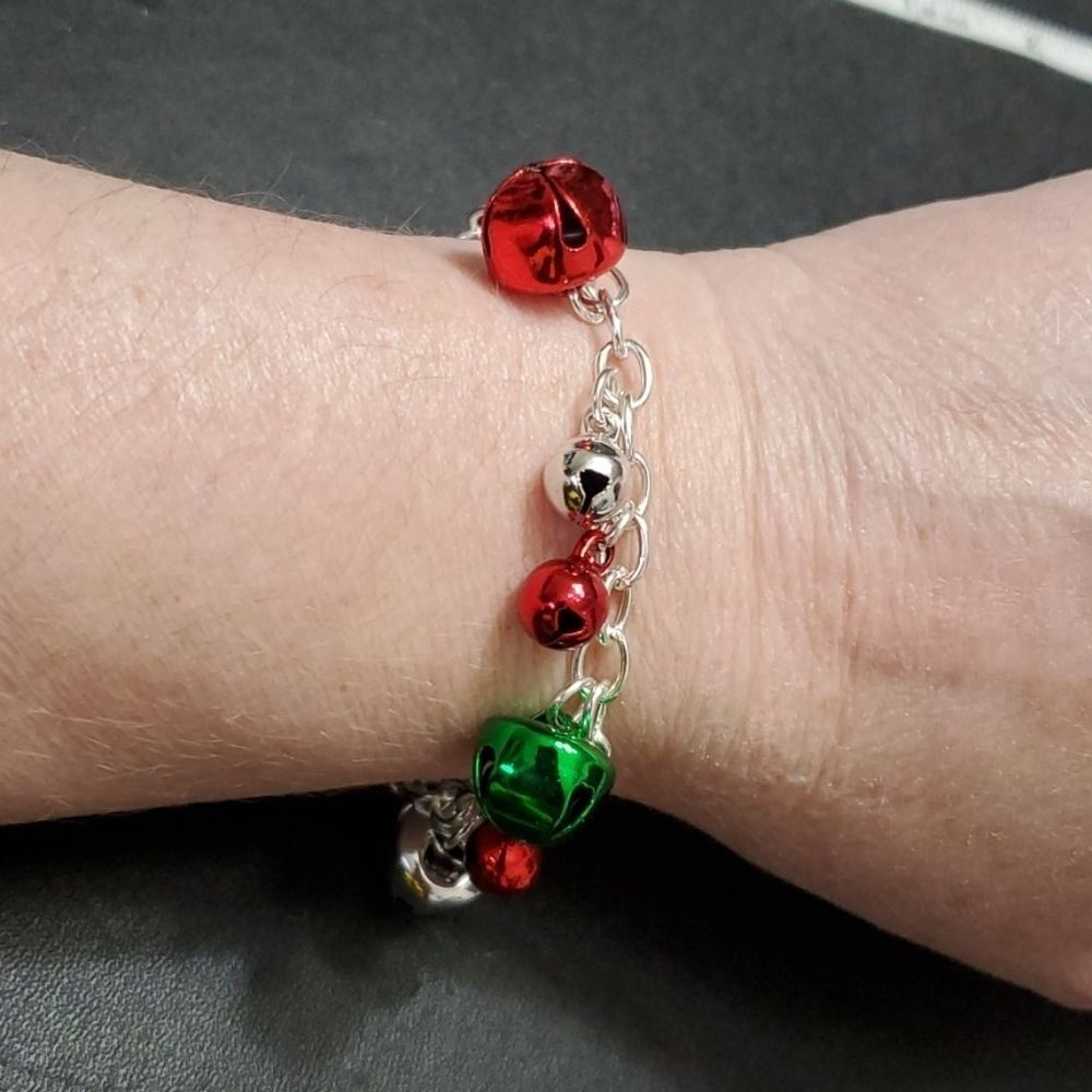 Silver tone holiday bells charm bracelet up to 7.25" red green